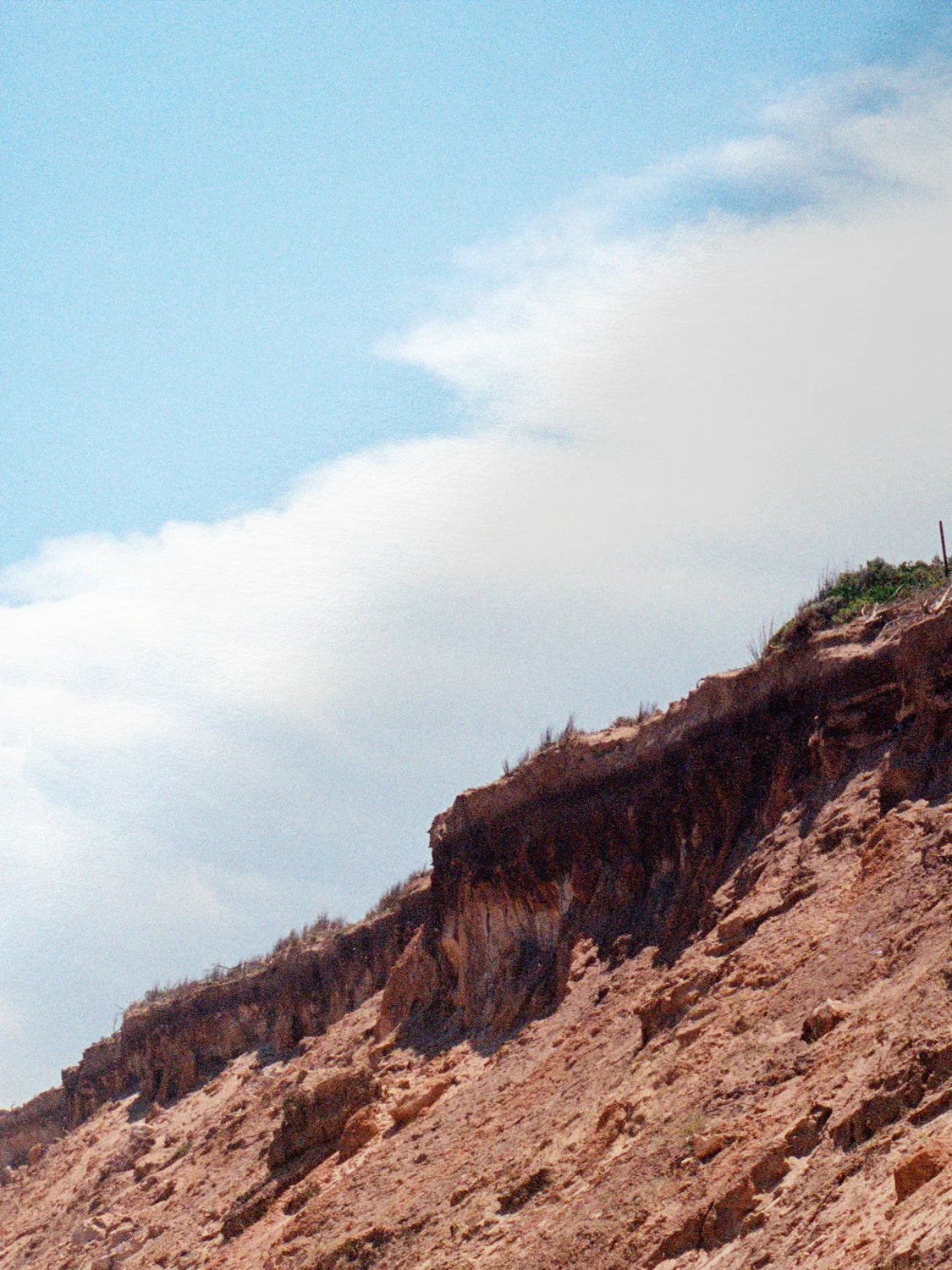 Thirteenth Beach Cliffs, Rocks and Clouds Landscape