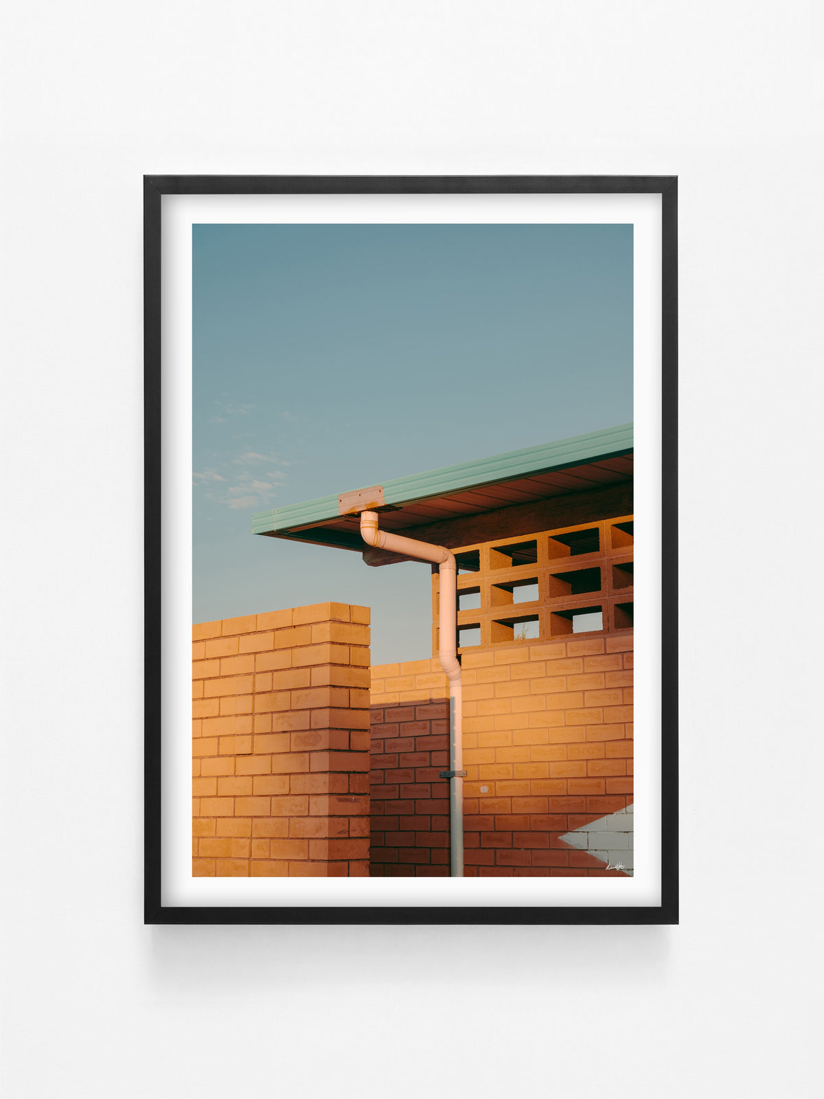 Queenscliff Brickwork at Sunset print in a black shadowbox frame
