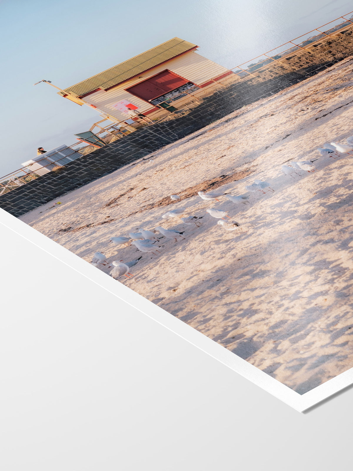 Corner of the St Leonards Pier Kiosk in Fading Light Portrait print showing archival Smooth Pearl photo paper and white border