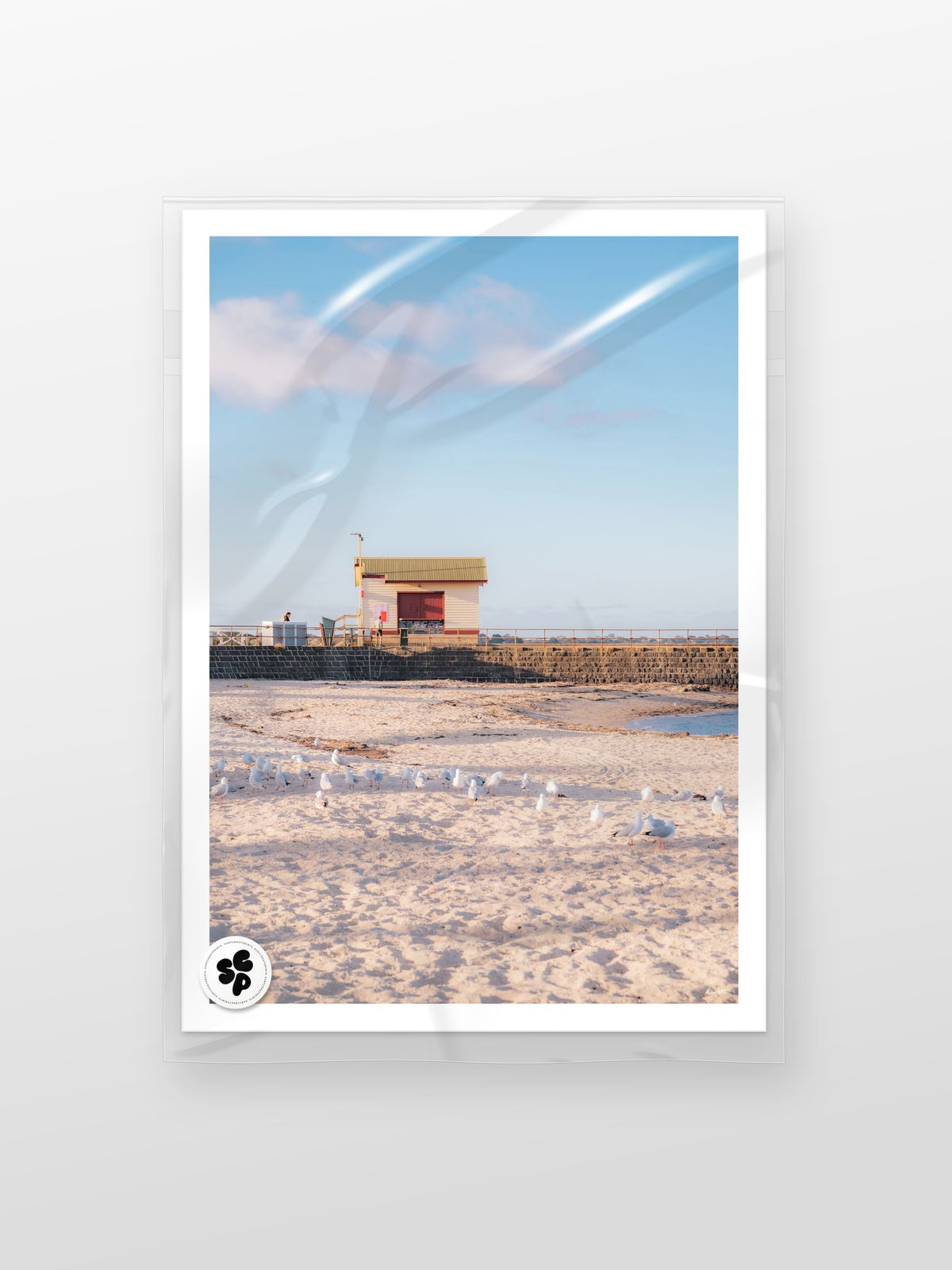 St Leonards Pier Kiosk in Fading Light Portrait print in a protective sleeve