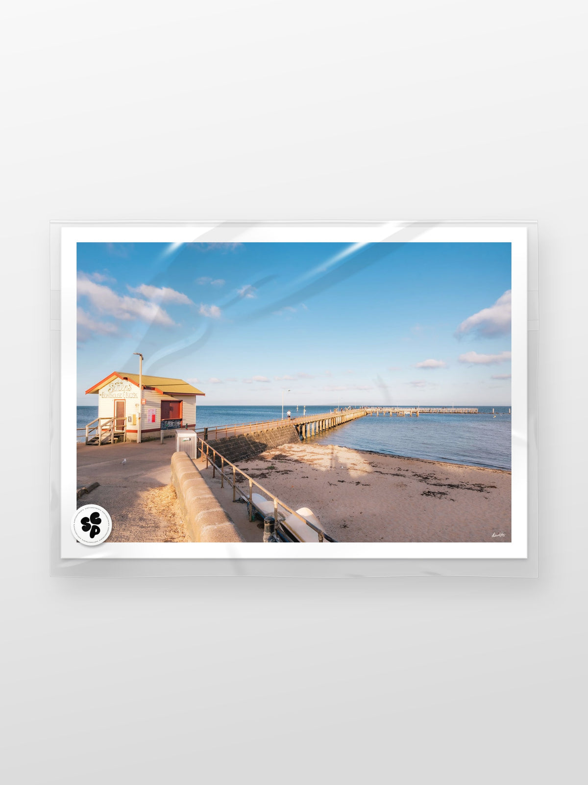 St Leonards Pier Sunset Walk print in a protective sleeve