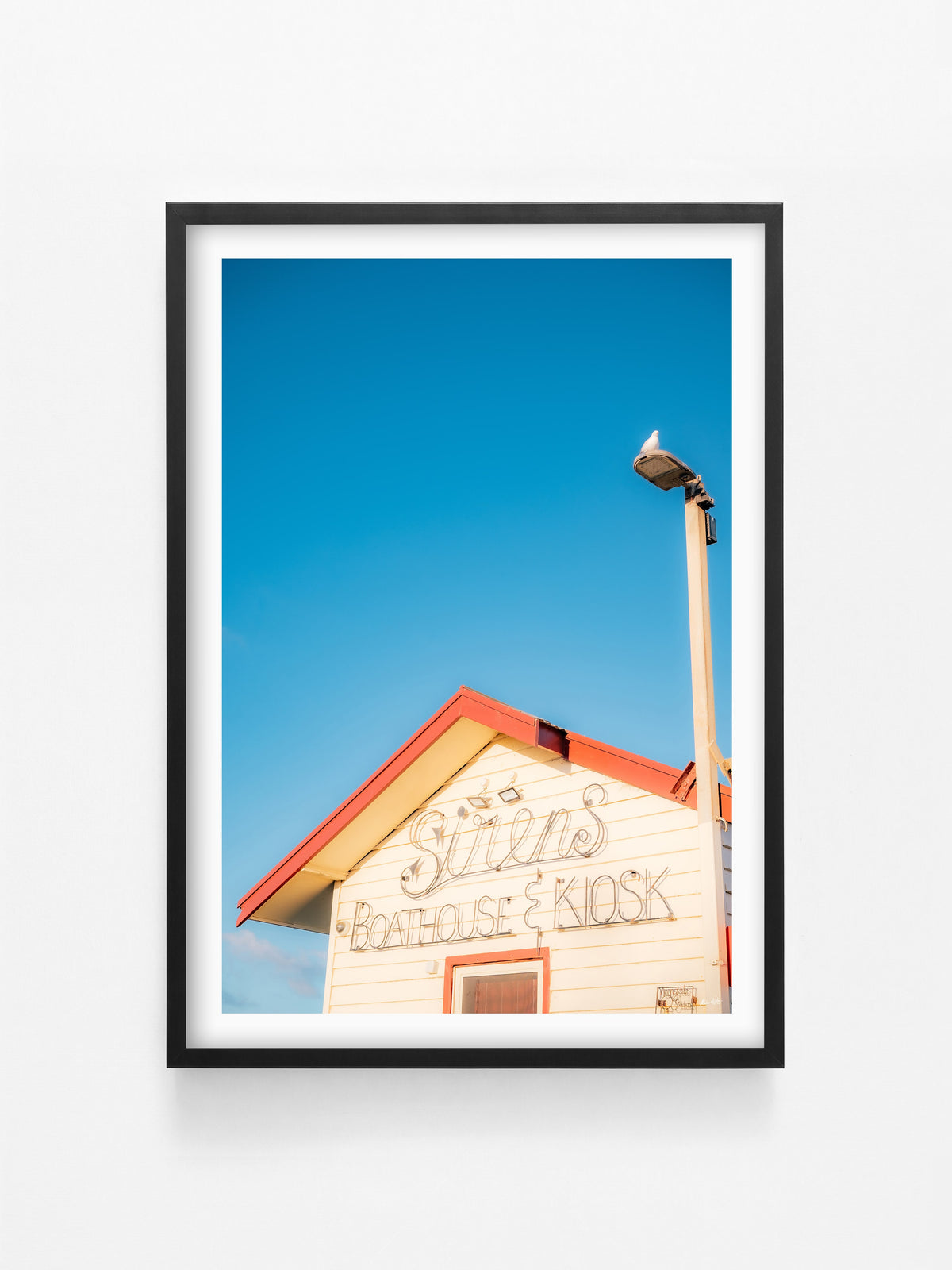 St Leonards Sirens Boathouse & Kiosk print in a black shadowbox frame