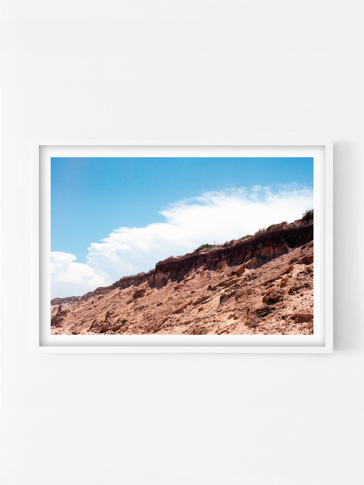 Thirteenth Beach Cliffs, Rocks and Clouds Landscape print in a white shadowbox frame, Barwon Heads