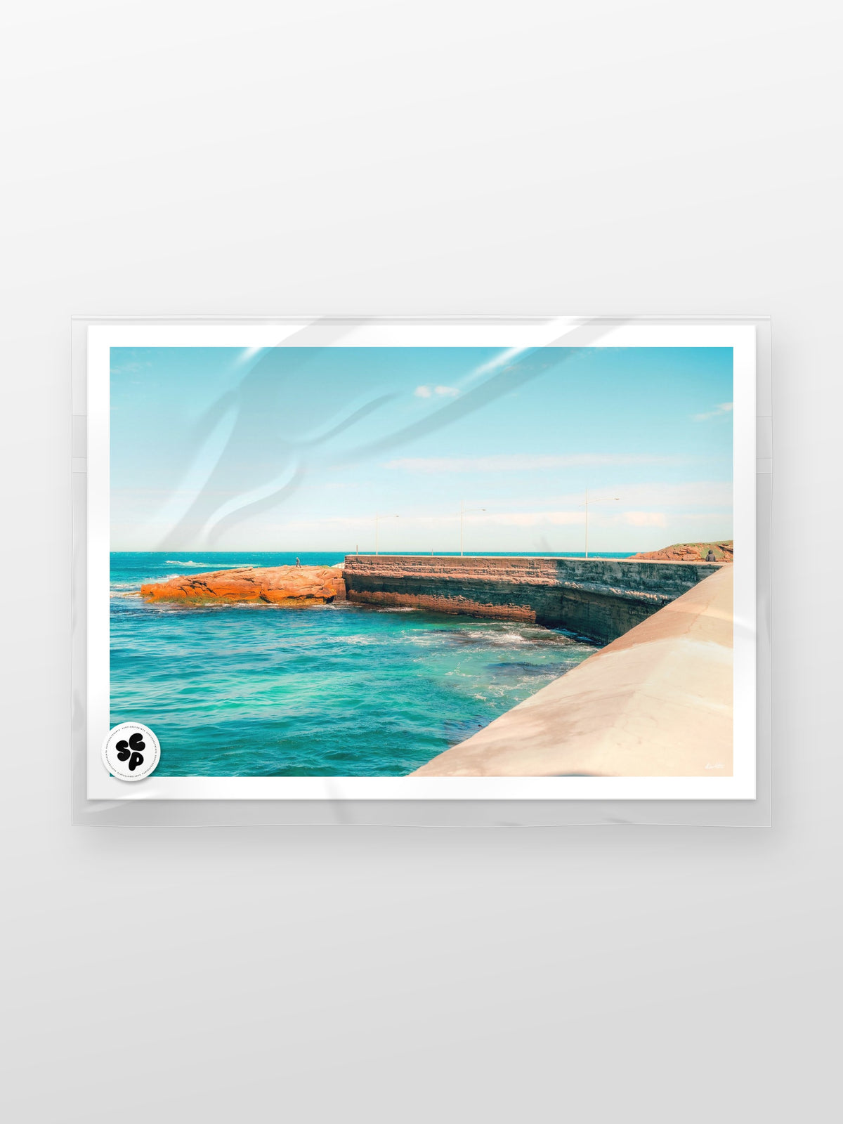 Warrnambool Pier Morning Walk print in a protective sleeve