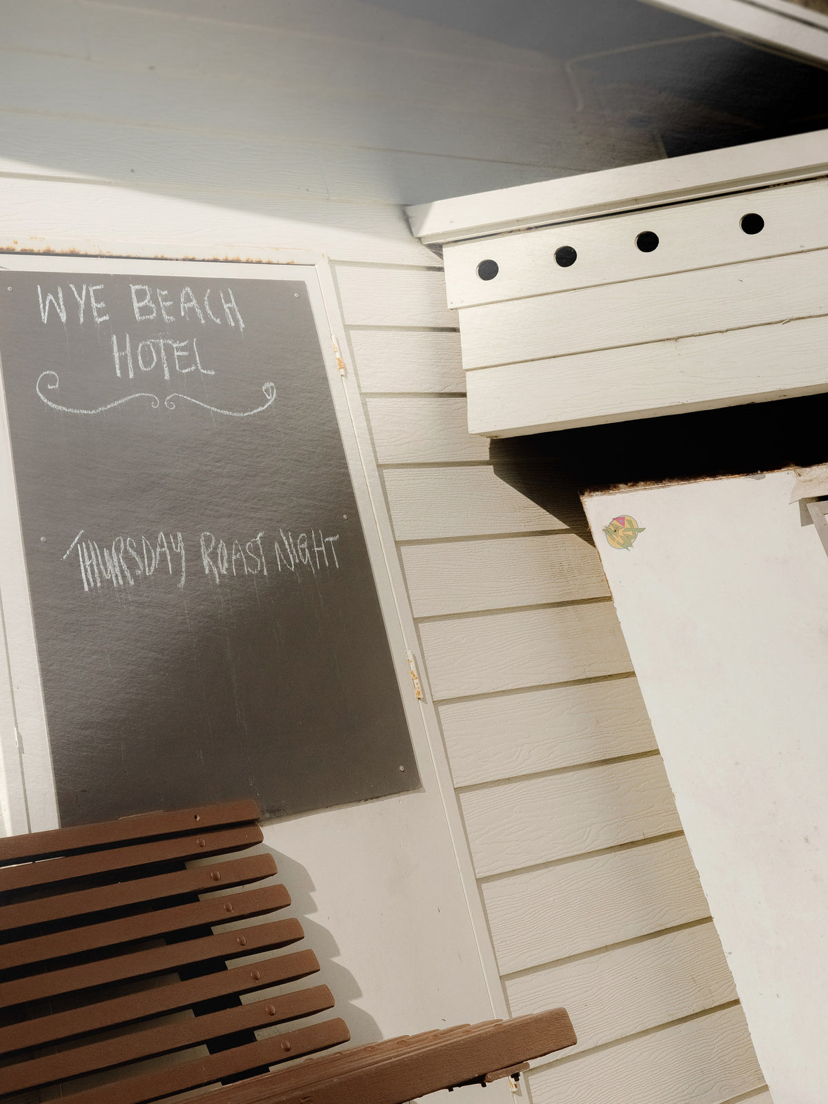 Close-up detail of the Wye Beach Hotel Sign and Ice Chest giclée print on archival Smooth Pearl photo paper
